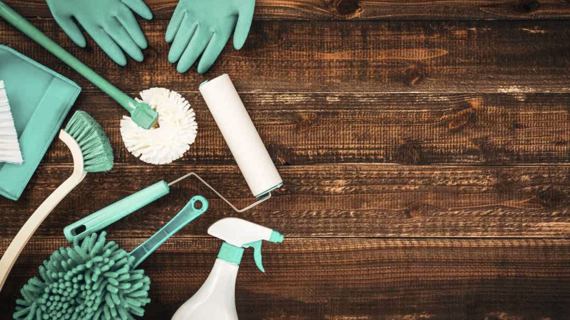 Cleaning tools like solution, roller, brush, gloves mope.