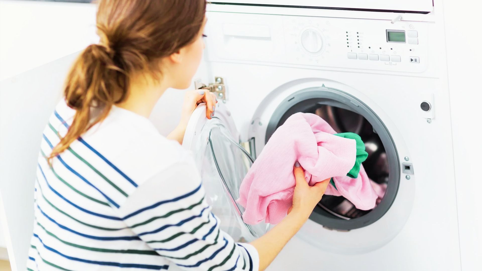 Front-load washer with damaged door seal, a common reason for squeaking cycles.