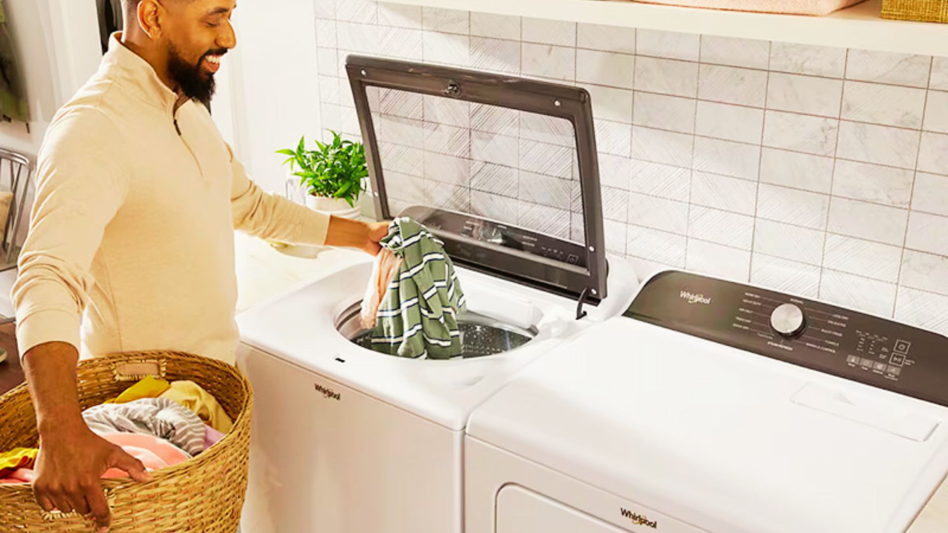 Unbalanced laundry load in top-load washer leading to drum squeaking sounds.