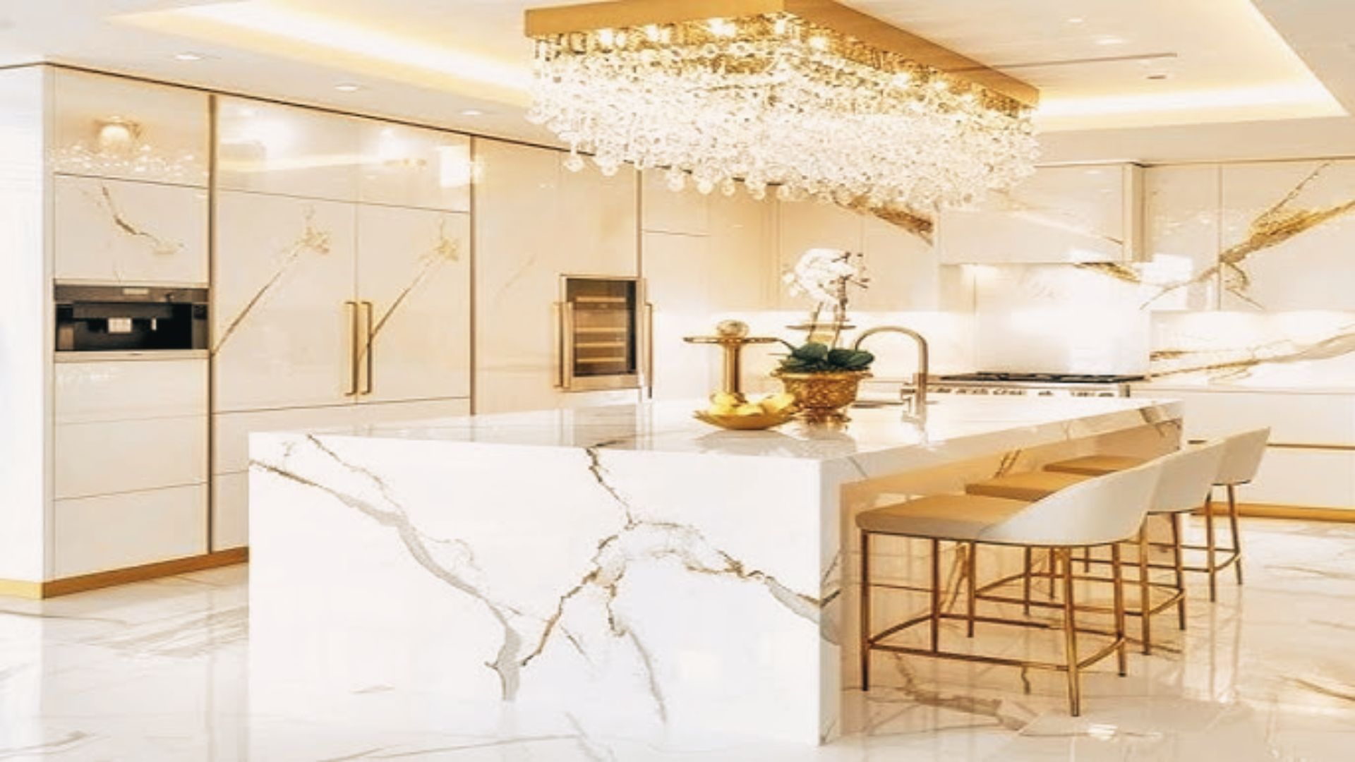 Modern Luxury white L-shaped kitchen with stainless steel refrigerator and range hood.