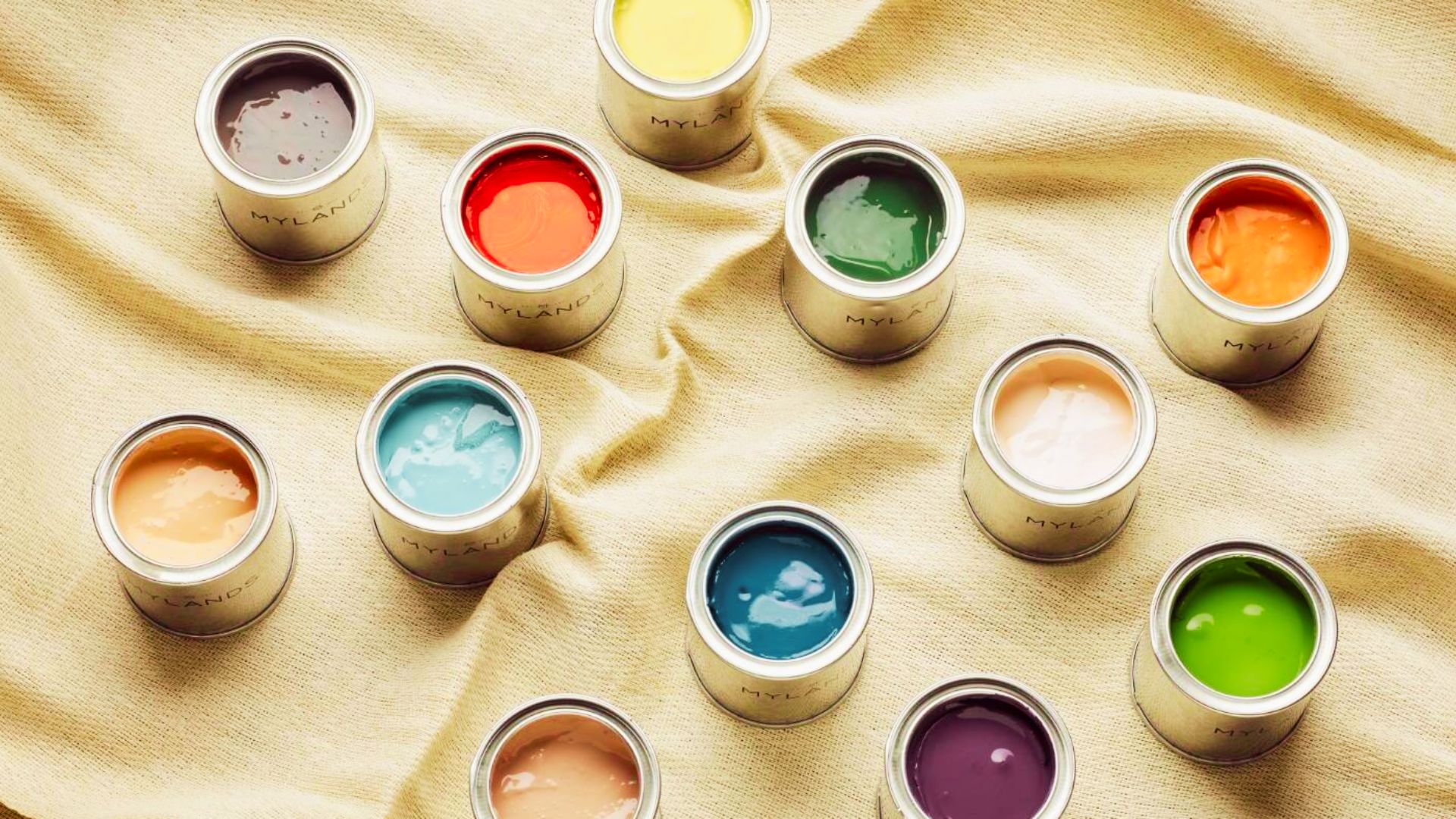 Refresh any room cheaply using bold paint tester pots to create an accent wall or furniture.
