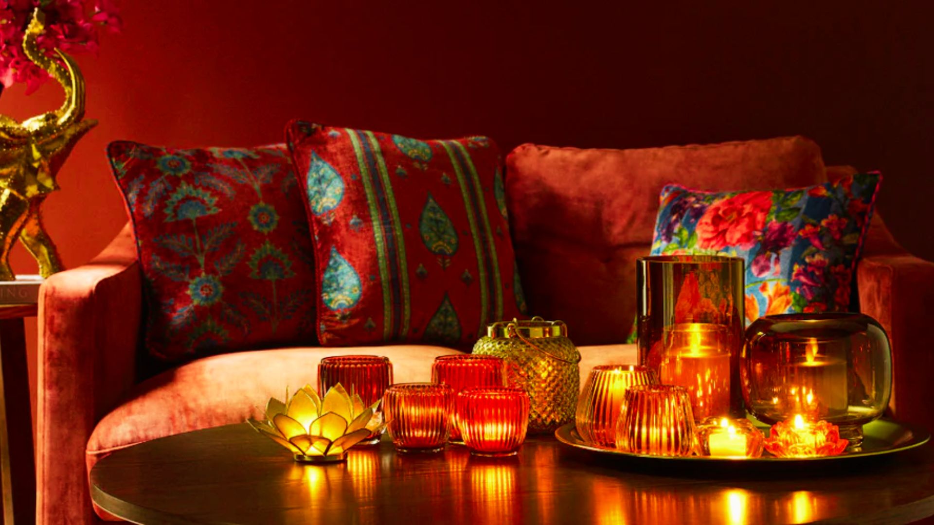 Create a luxe mood with affordable candles, lotus lights, and colorful cushions on a budget.
