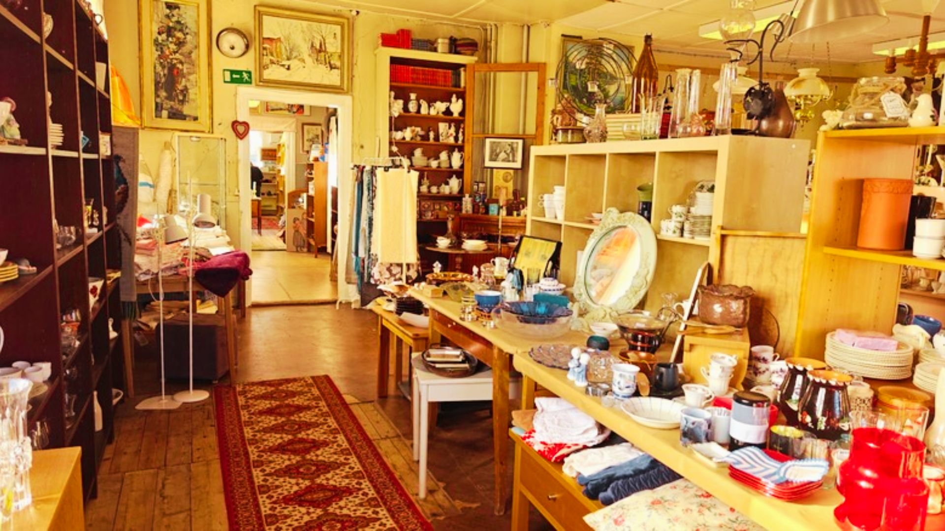 Score perfect decor at thrift stores like vintage mirrors, dishes, and rugs for a cozy budget look.