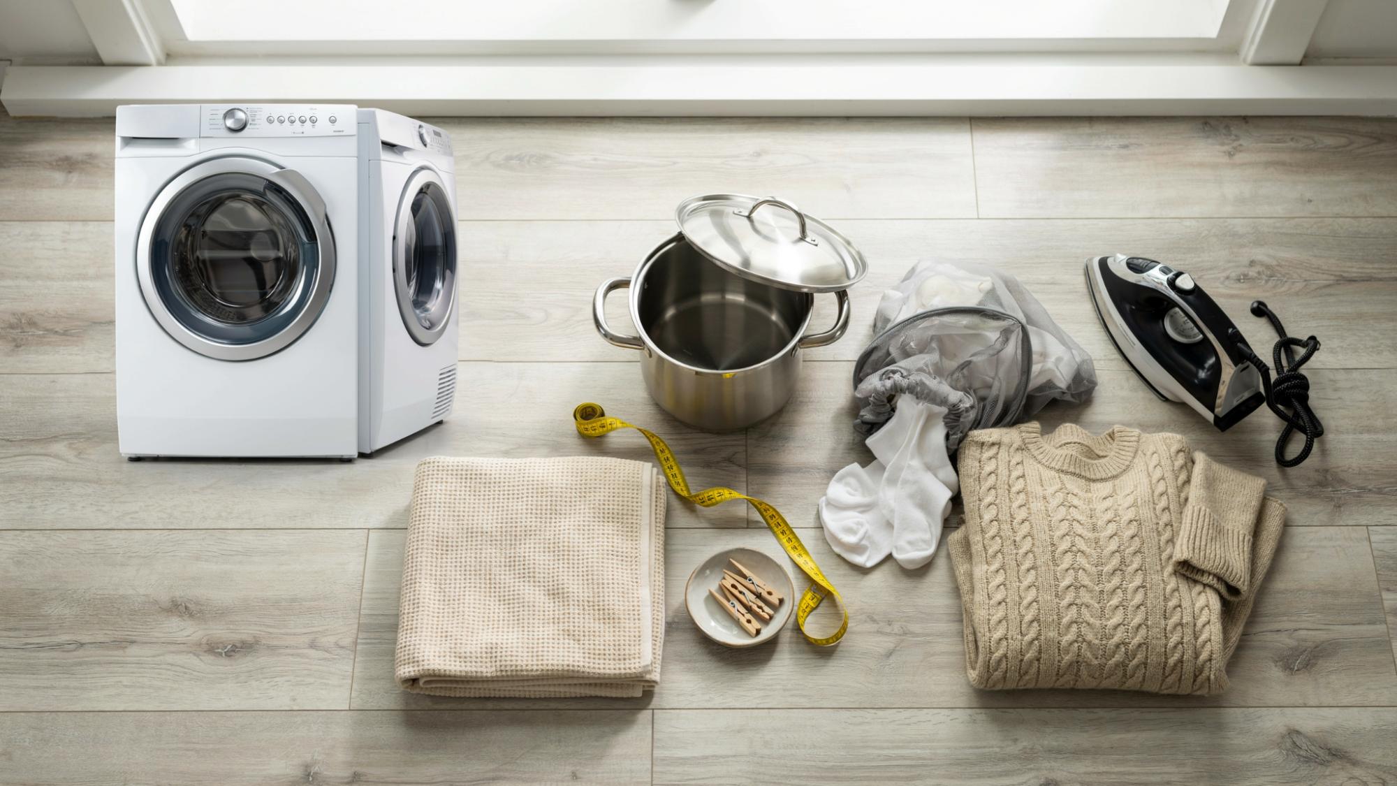 Important household items needed to safely shrink a sweater at home.
