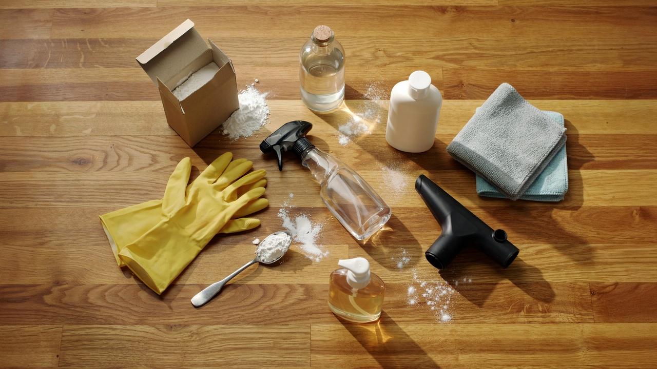 Cleaning supplies needed to remove vomit stains from a couch.